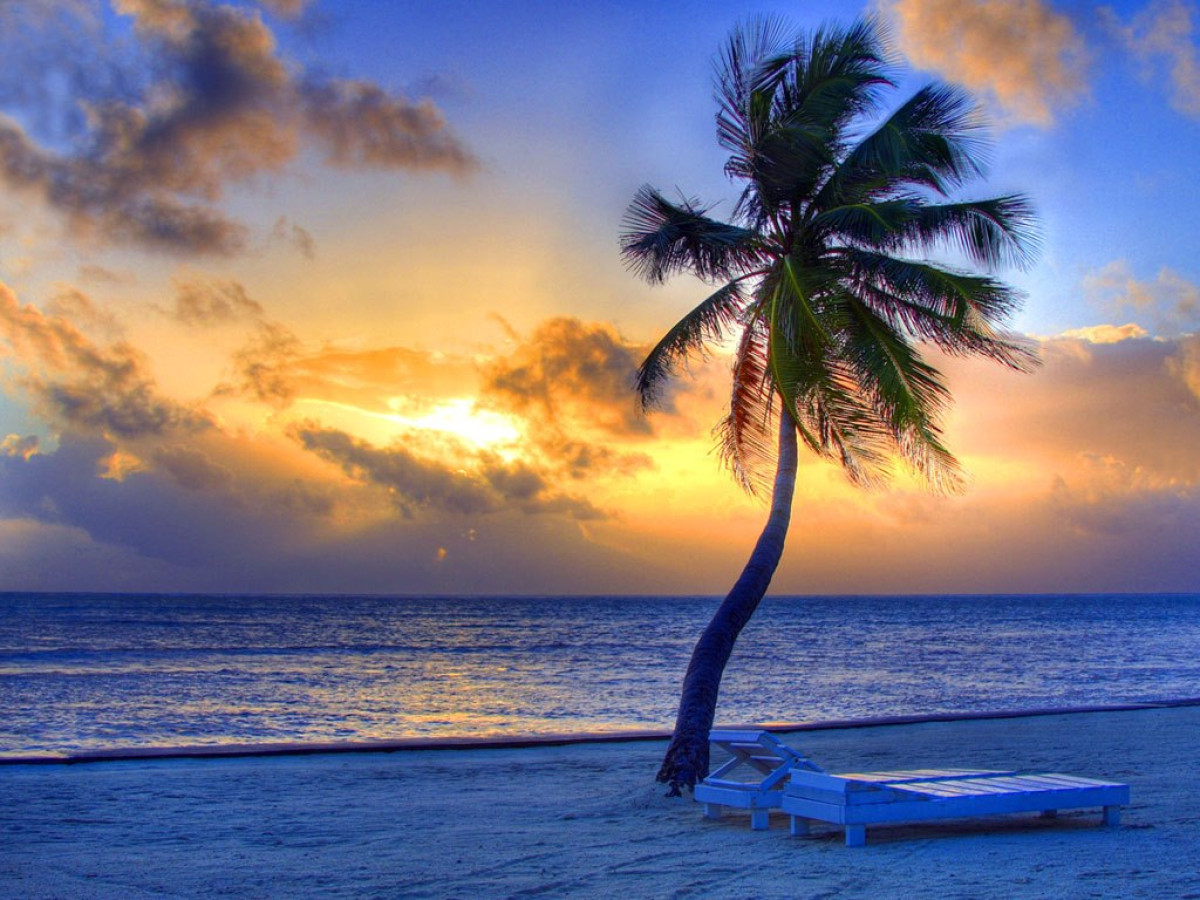 Zonsondergang Ambergris Caye Belize - Undiscovered.nl