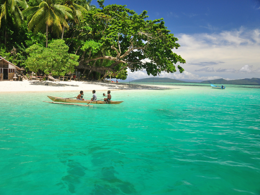 Bootje in Raja Ampat, Oost-Indonesië - Undiscovered.nl